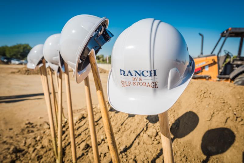 Ranch RV & Self-Storage hats on shovels